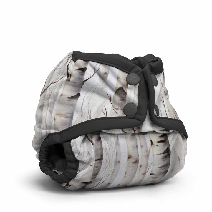 Rumparooz Newborn Cloth Diaper Cover by Kanga Care in Christmas print called Aspenglow with aspen trees during fall on a white background