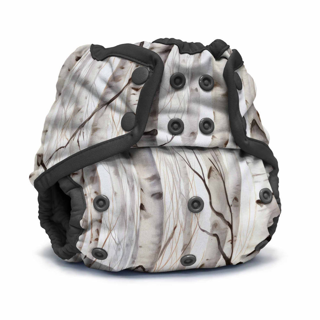 Rumparooz One Size Cloth Diaper Cover by Kanga Care in Christmas print called Aspenglow with aspen trees during fall on a white background