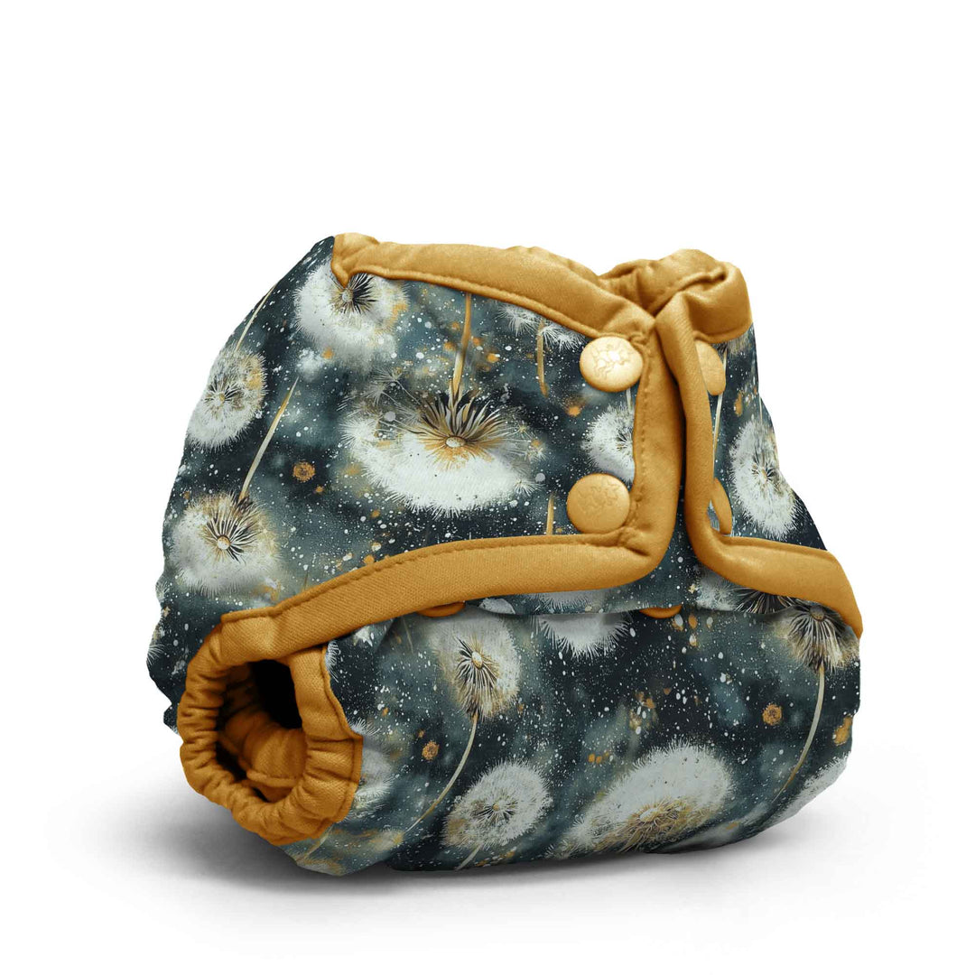 Newborn Cloth Diaper Cover with dandelion pattern and yellow trim on a navy background
