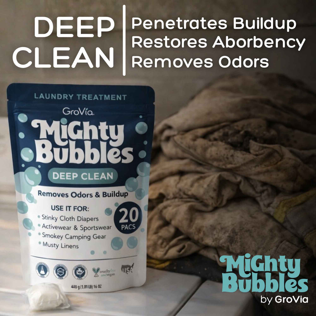 Mighty Bubbles laundry treatment package with text about its features on a wooden surface.