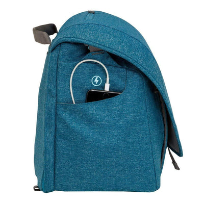 Hie Diaper Bag in the color Bay, showing the side pocket with the phone charging cable. 